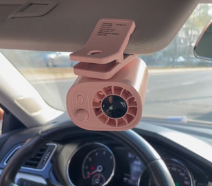1. Clip it on to your car visor, headrest, or another secure spot.